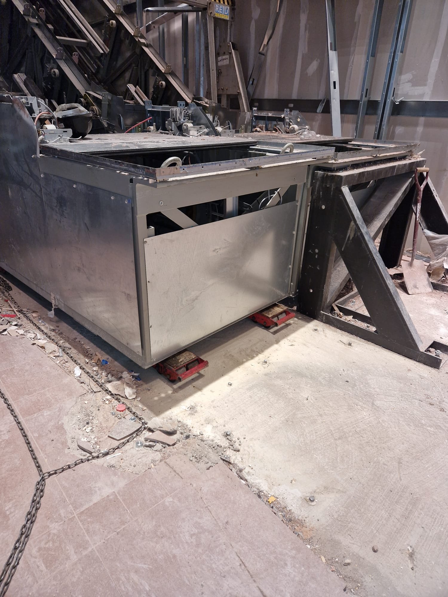 Escalator machinery removal in progress